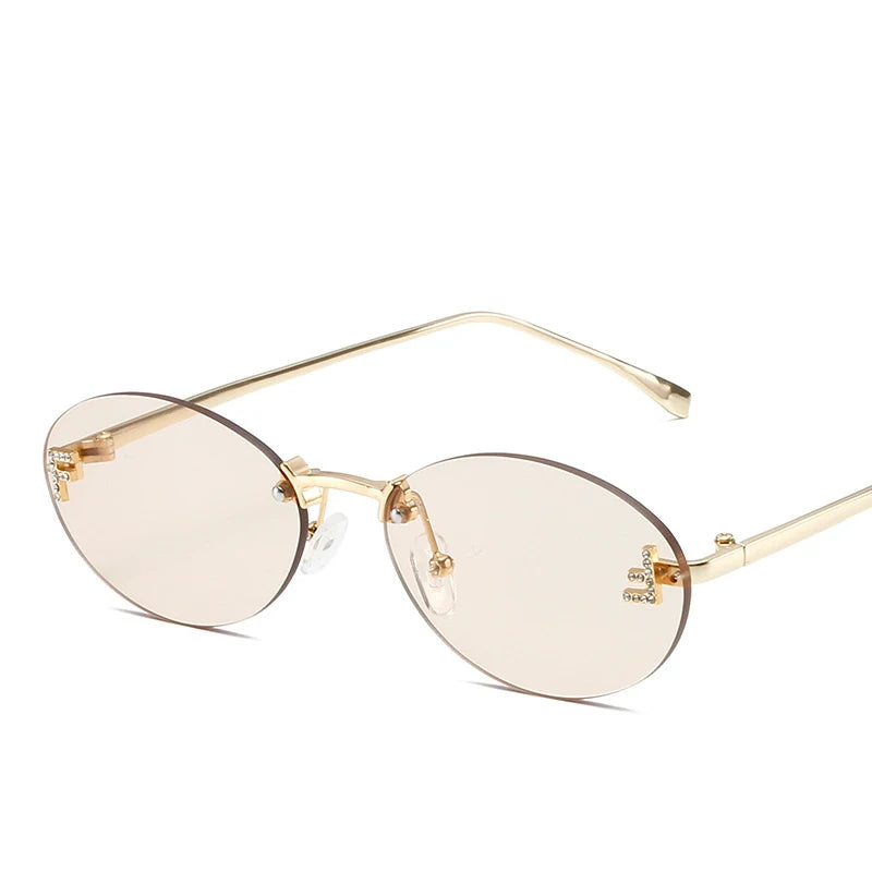 Óculos Diamond F Oval – Estilo Sofisticado com Armação Sem Aro e Detalhe Luxuoso