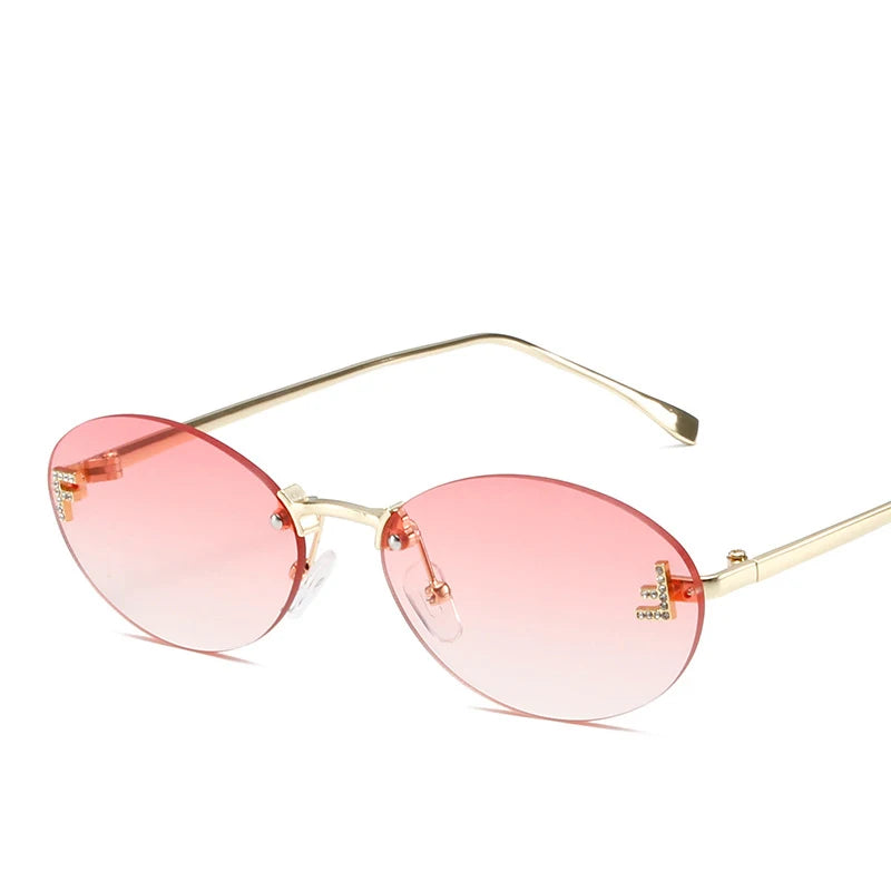 Óculos Diamond F Oval – Estilo Sofisticado com Armação Sem Aro e Detalhe Luxuoso
