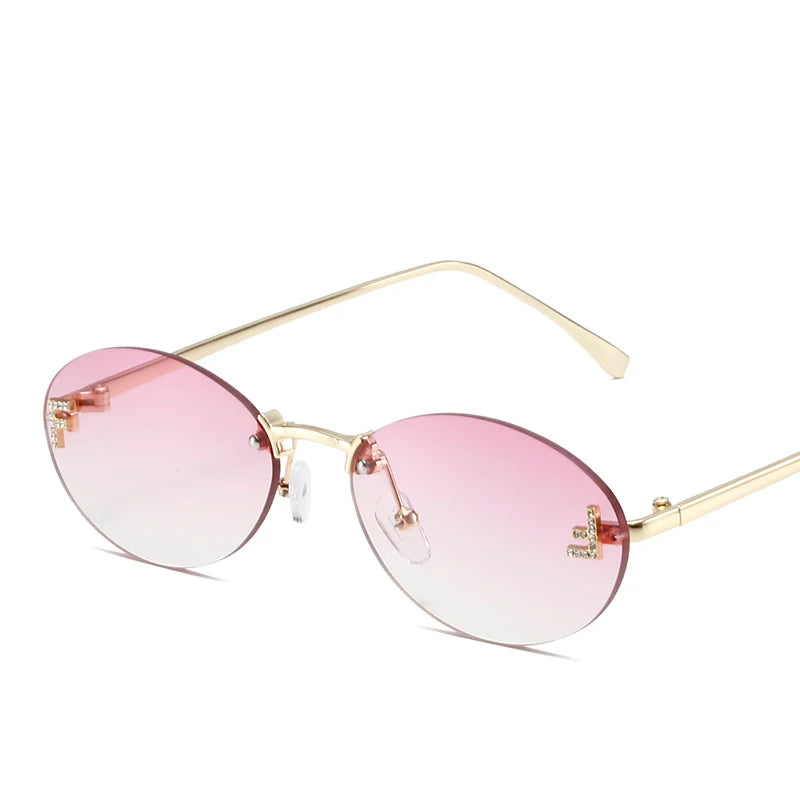 Óculos Diamond F Oval – Estilo Sofisticado com Armação Sem Aro e Detalhe Luxuoso