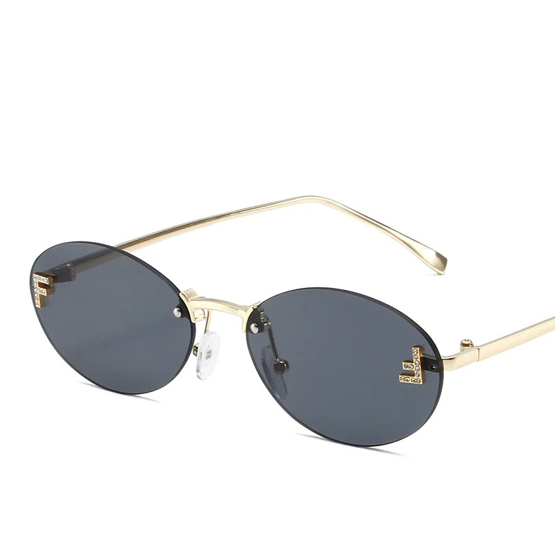 Óculos Diamond F Oval – Estilo Sofisticado com Armação Sem Aro e Detalhe Luxuoso