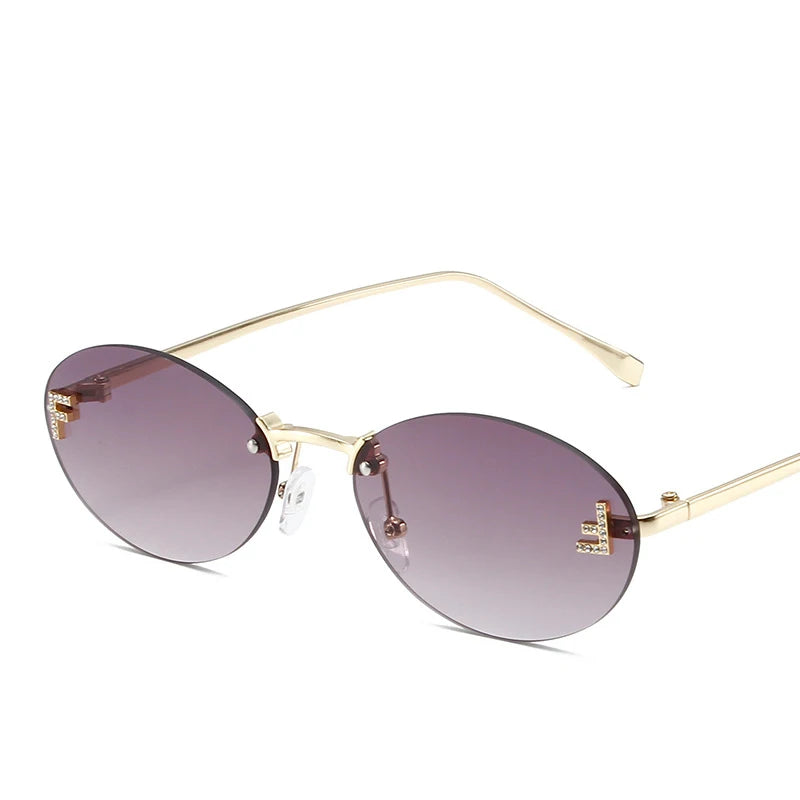 Óculos Diamond F Oval – Estilo Sofisticado com Armação Sem Aro e Detalhe Luxuoso
